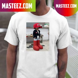 Hasbullah wearing the MSCHF Big Red Boots T-shirt
